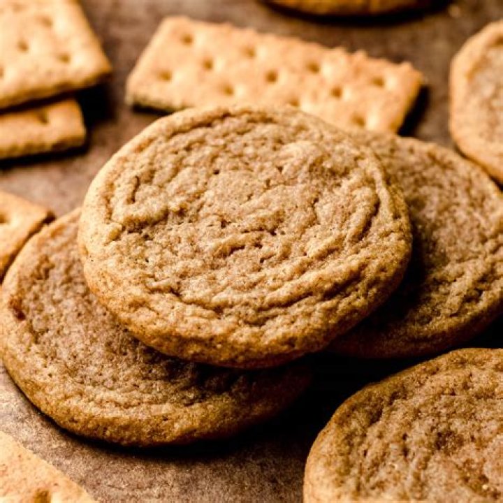 Graham cracker cookies with a swirl of white frosting.