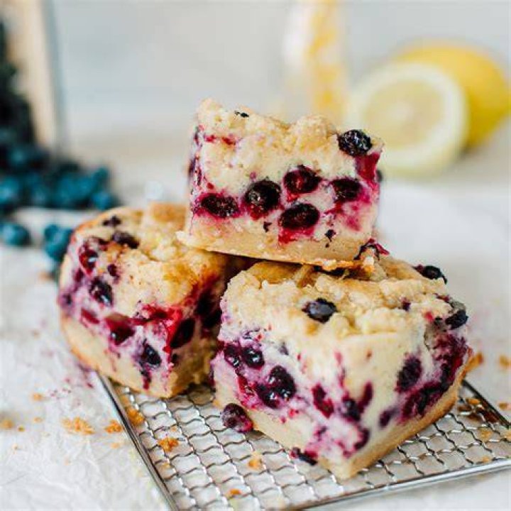 Ingredients for lemon blueberry bars: flour, blueberries, lemon, sugar, butter, eggs. vanilla.